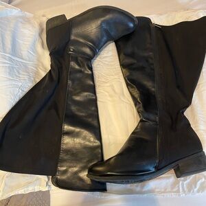 Wide-width size 12 black knee-high boots.